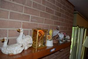 lot 133 image: Bird figurines and clock on fireplace mantle
