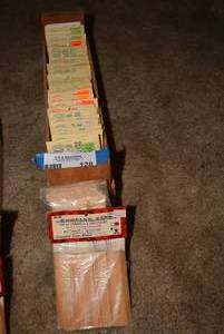 lot 128 image: Large quantity of balsa wood RR Ties and wood, magna-matic and 5 couplers