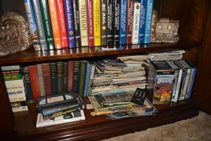 lot 147 image: Railroad and vintage text books with Train bookends and large quantity of national park area info