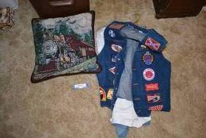 lot 255 image: Train Dcor Pillow, Jean Jacket Vest with Train Patches, and More