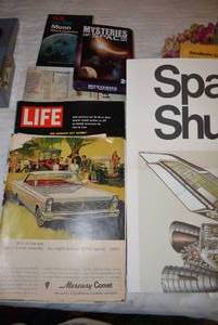 lot 257 image: Space Shuttle Poster, Mysteries of Space DVDs, US on the Moon Book, and Vintage Life Magazine