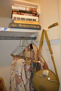 lot 277 image: Military fatigues, Knife and War Books