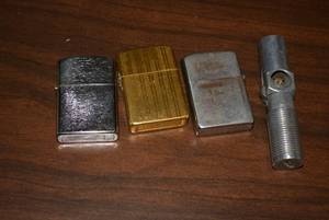 lot 305 image: Lighters Zippo, Storm King and Champ