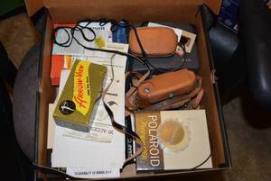 lot 319 image: Vintage Cameras Retina II and Polaroid 340