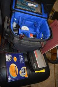 lot 322 image: Camera Case, HP Digital Camera, Canon Date Back, and Canon Camera Plus Color Slides and Accessories