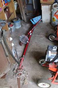 lot 383 image: Tree Branch Trimmer, Nut Roller, Post Hole Digger, and Crowbar