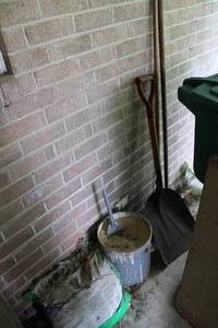 lot 396 image: Wind Chimes, Shovel, Broom, Sand, Potting Mix and Fertilizer