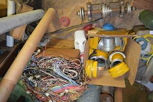 lot 471 image: large box of wire and pipe clamps In attic will need taken down