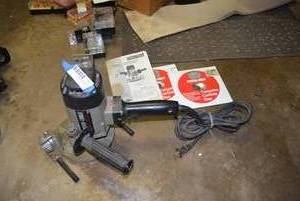 lot 428 image: Poter Cable Paint Remover Model 7403 and 2 Tungsten Carbide Discs