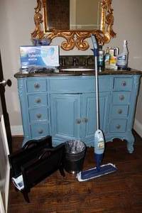 lot 17 image: Contents of Bathroom Cabinet Hardware, Cleaners and Wooden Magazine Rack