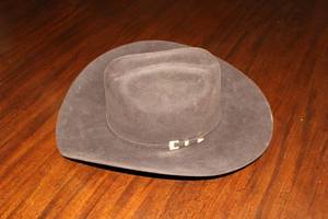 lot 29 image: Larry Mahans Cowboy Hat Size 7 14, 20X, Brown Color