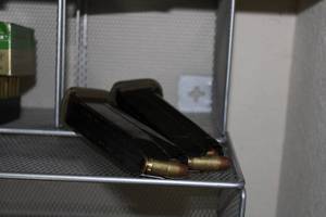 lot 47 image: Ammo Two 45 ACP Clips, Partially loaded