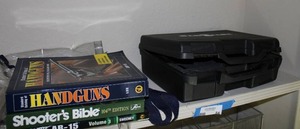 lot 84 image: NiteSite CaseCamera and Gun Books