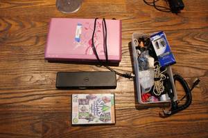 lot 114 image: Dell Plug and Display Model D3000, Memorex DVDCD Player, 10 Charging Cable for PS4 and Misc. Cables