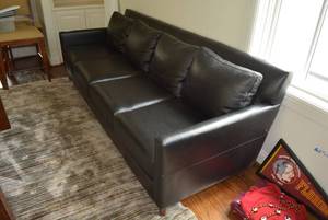 lot 279 image: Black Leather Sofa with Removeable Cushions