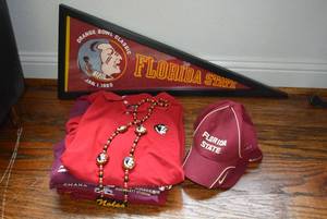 lot 281 image: Florida State Items Pennant, Shirts, Hats and Necklace