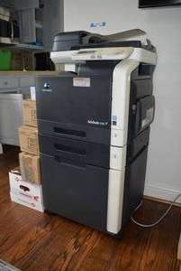 lot 284 image: Konica Minolta Bizhub C35 Office Machine, Paper Reams and waste Toner bins