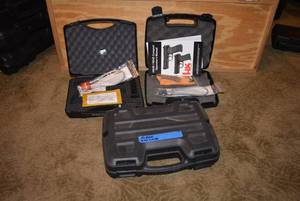 lot 381 image: 2 HK 9mm Hand Gun Cases,  includes clip, locks, cleaners and more see pics &1 Plano Gun Case(NO GUNS) PREVIEW RECCOMMENDED