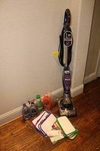 lot 262 image: Shark Duo Carpet, Wood & Hard Floor Cleaner, Model SP1000 26 with extra pads and cleaners