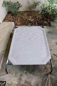 lot 575 image: Steel-Legged Elevated Dog Bed