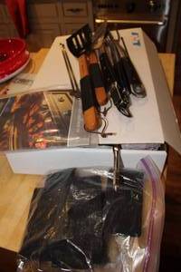 lot 580 image: Lynx Grill Accessories Rotisserie parts and Grilling Utensils and Cleaning Pads