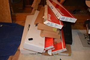 lot 439 image: Large lot of shipping boxes for guns many still have accessories in them and paperwork. MUST TAKE ENTIRE LOT ALL BOXES MUST GO