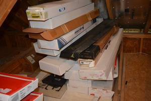 lot 440 image: Large lot of shipping boxes for guns many still have accessories in them and paperwork. MUST TAKE ENTIRE LOT ALL BOXES MUST GO