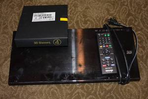 lot 545 image: Sony Blu-ray DiscDVD Player with Glasses and Remote