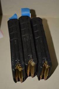 lot 556 image: 3 Ammo Clips, 7.62 x 51 approx 20-30 rounds