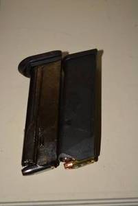 lot 566 image: 9mm Clips 1 Glock and 1 FNH with aprox 10 Rounds