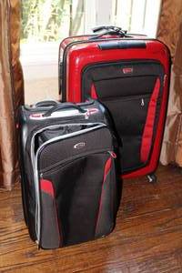 lot 185 image: Tumi Luggage Ducati Small Case and Large Red Hard Case