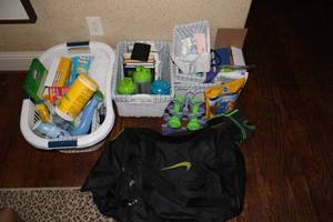 lot 583 image: Misc. Lot Weights, Baskets, cleaning supplies, dog treats, power cord