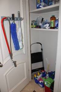 lot 247 image: Contents of Closet Cleaning Supplies and Step Ladder