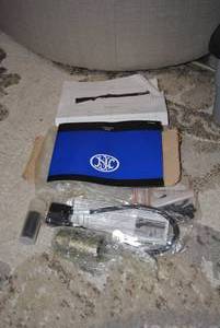 lot 46 image: FNH 12 gauge Accessories Choke, tools, and Manuals