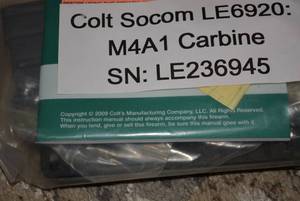 lot 119 image: Colt Socom M4A1 Carbine 5.56 Cal Accessory bag including Clips tools and strap (GUN NOT INCLUDED)