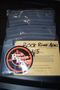 lot 602 image: Rock River Arms 5.56 2 clips and Accesories