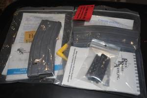 lot 603 image: Gun Accessories Rock River Arms LAR-15   5.56 2 clips and accessories