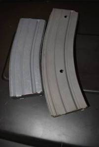 lot 606 image: 2 Clips No markings look to be 5.56 one 30 rds one 40rds PREVIEW RECCOMMENDED