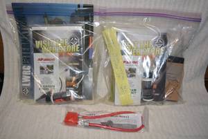 lot 636 image: Gun Accessories ONLY LWRC SRT M6A2R5B16  GUNOIL AND CLIP AND SAFETY LOCK