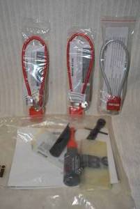 lot 638 image: Gun Accessories Benelli Parts and 3 Safety Locks
