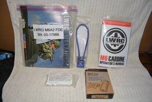 lot 639 image: Gun Accessories ONLY LWRCi M6A2 FDE  , MIAD Grip and Safety Lock (NO GUN)