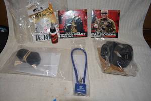 lot 640 image: Gun Accessories ONLY M4, CDs, Straps and Safety Lock (NO GUN)