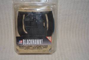 lot 647 image: Blackhawk Gun Holster SERPA Level 2 Sportster, Right Hand, Gray