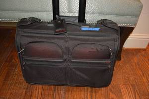 lot 680 image: Tumi Luggage Small Rolling Garment Bag