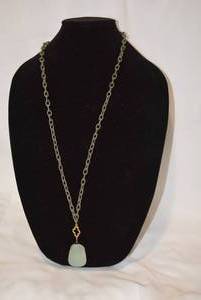 lot 720 image: Signed JB Sterling Silver vermeil green Chrysoprase stone pendant (tested) with twisted wire and quatrefoil connector. Retail tag marked JB USA 925. On a 32 fashion necklace