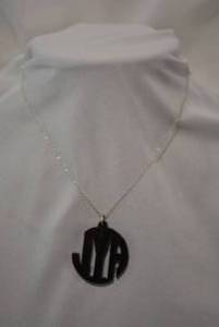 lot 721 image: Sterling Silver 16L necklace with acrylic monogram pendant. Chain marked 925