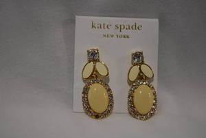 lot 722 image: Signed Kate Spade (New York) enamel and crystal dangle poststud earrings on original retail card. Missing one crystal.