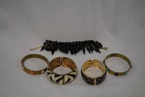 lot 723 image: (5) Bracelet selection. Includes (2) enamel cuff bracelets, (2) signed Tosca metal bracelets w simulated turquoise, blue lapis and angel skin coral glass cabochons and a black acrylic bead bracelet.
