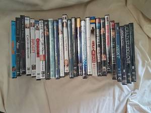 lot 249 image: 26 New-In-Box PG DVD Movies