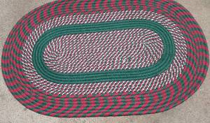 lot 212 image: Red, white and green rug